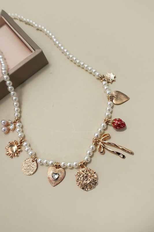 Pearl Beaded Bow and Strawberry Charm Necklace