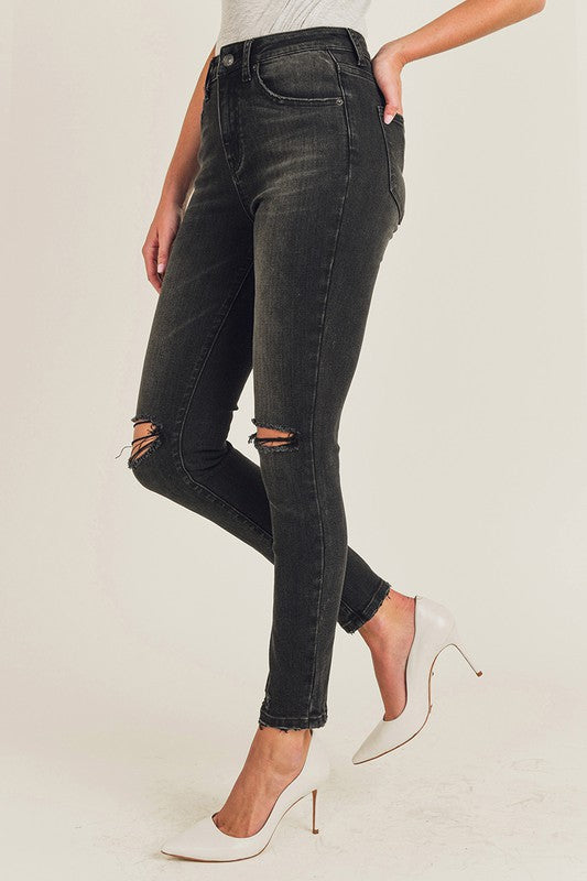 Flynn High Rise Knee Distressed Skinny Jean