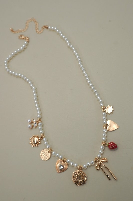 Pearl Beaded Bow and Strawberry Charm Necklace
